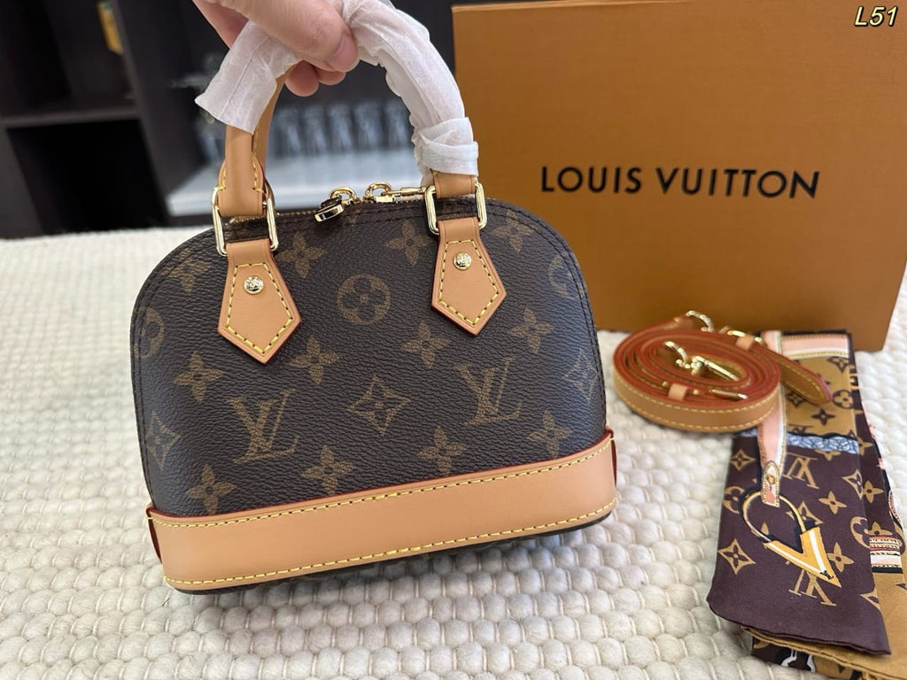 Classic Monogram Alma Handbag