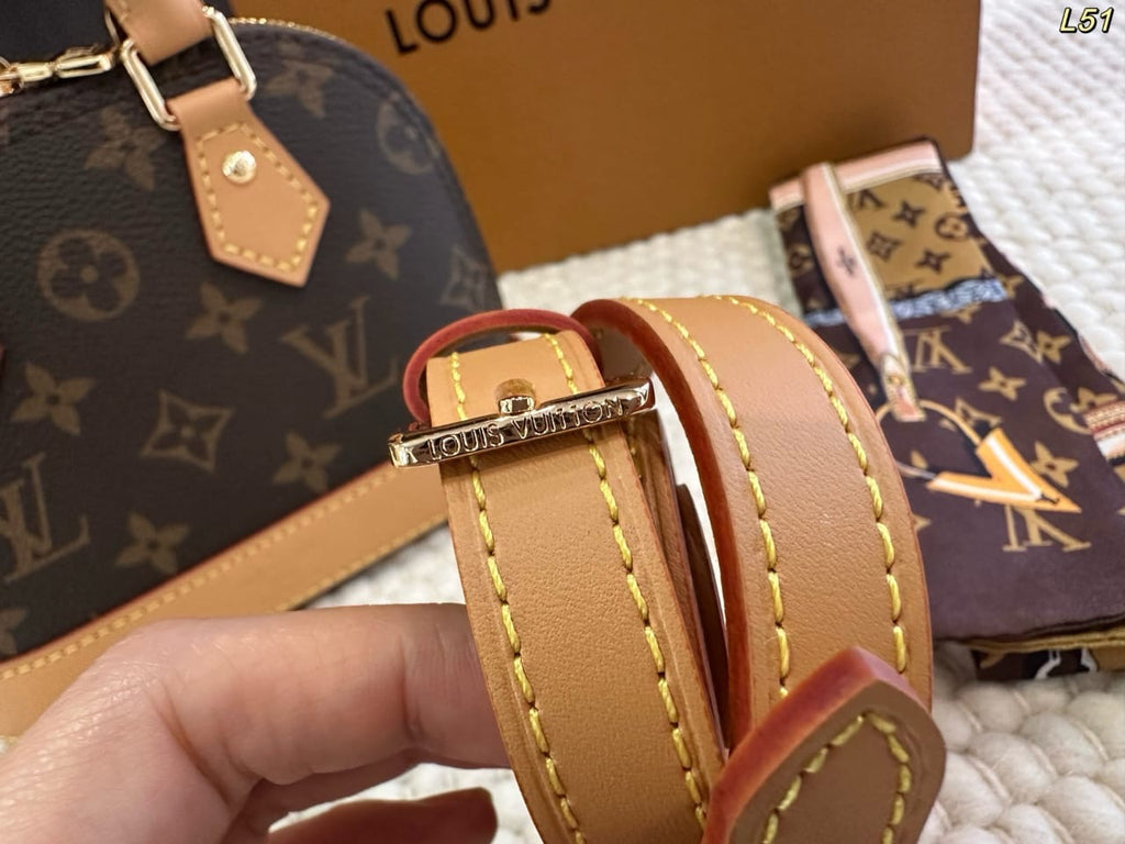 Classic Monogram Alma Handbag