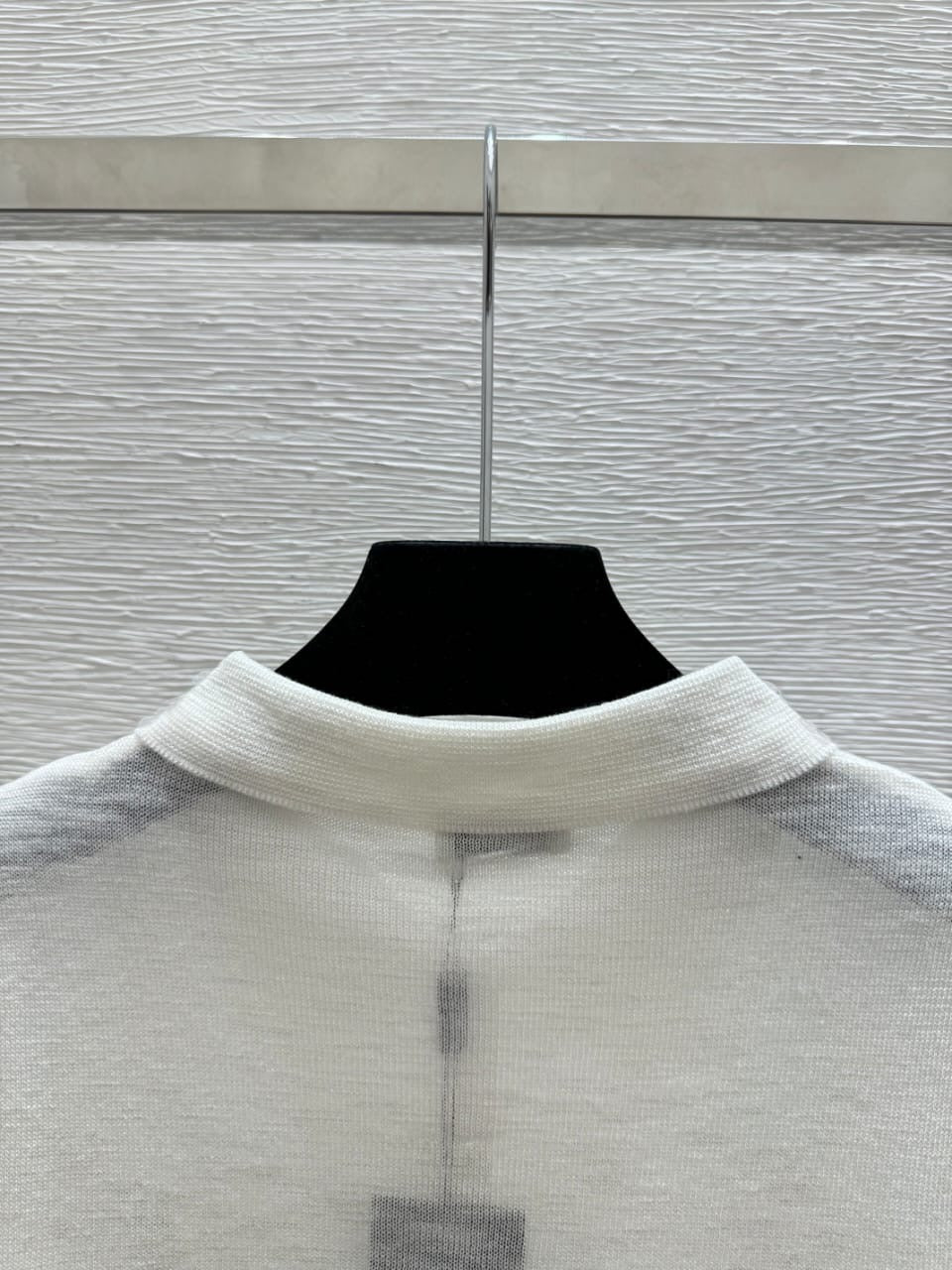 White Sleeveless Knit Polo Top with Embroidered Monogram Detail