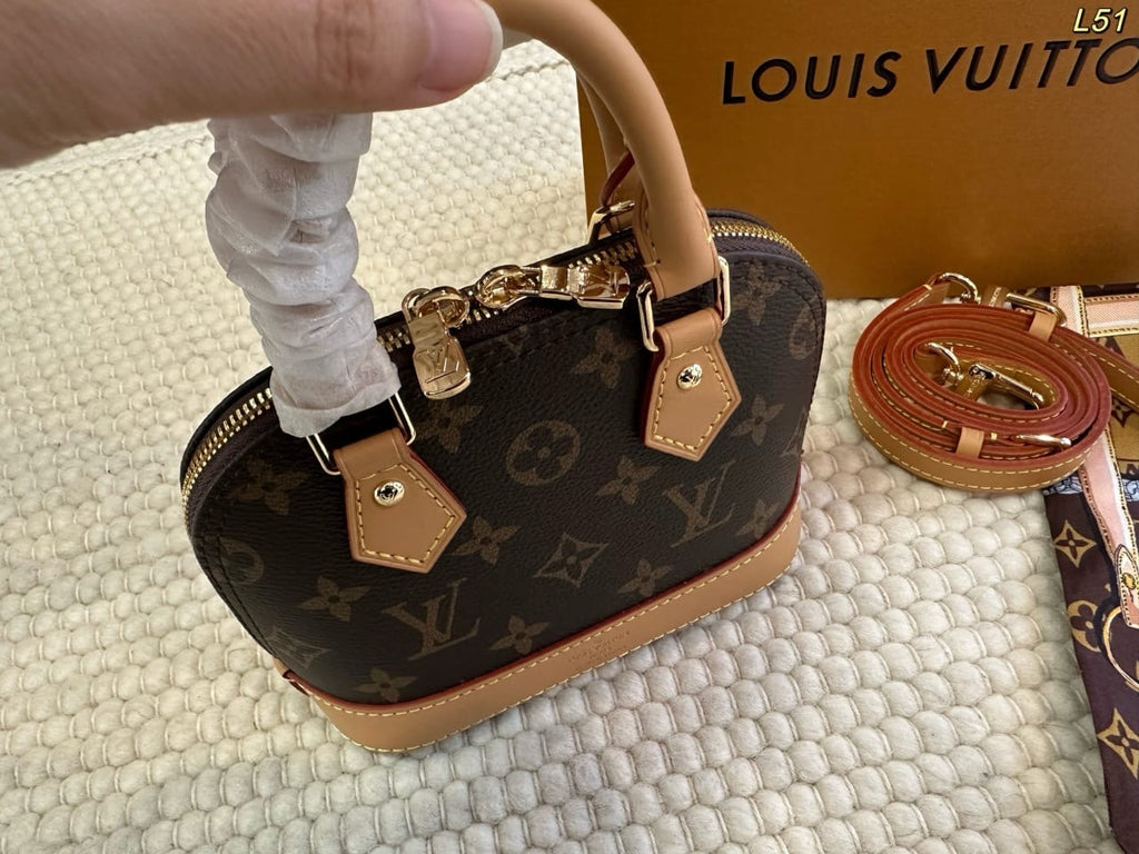 Classic Monogram Alma Handbag